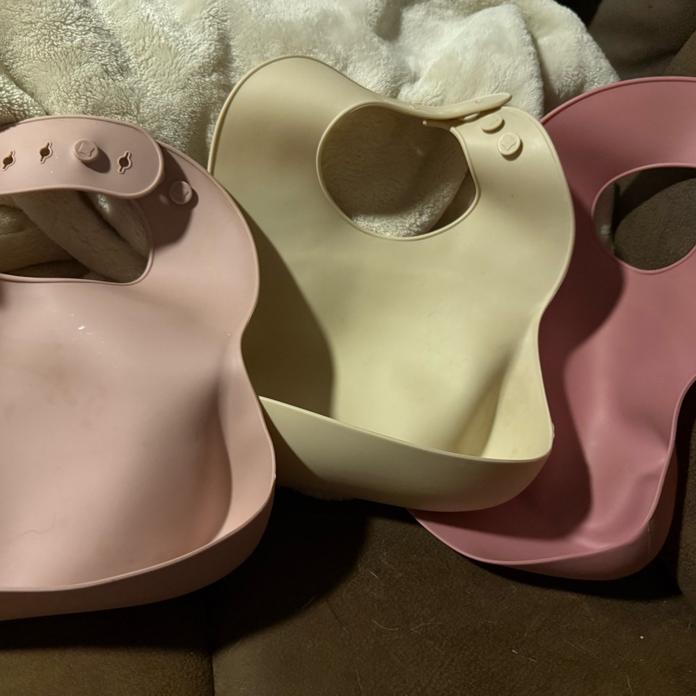 Set of Three Silicone Baby Bibs in Pink and Cream